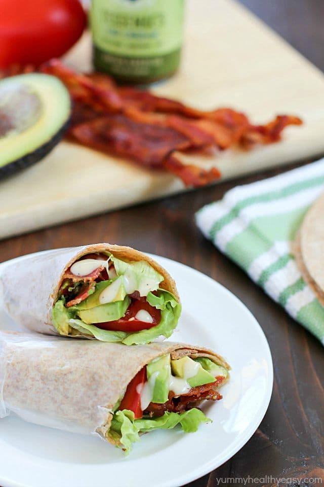 Sick of boring lunches? You NEED to throw an easy BLTA wrap in the lunchbox! What could be better than a bacon, lettuce, tomato & avocado wrap with a creamy dressing? Seriously the most amazing wrap ever. #Tessemaes #BacktoSchool #ad