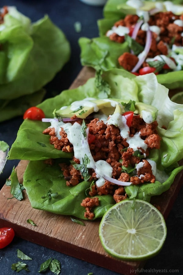 Ground Turkey Tacos in Lettuce Wraps topped with a fresh Cilantro Lime Crema – a great healthy weeknight meal option that’s full of flavor and gluten free!