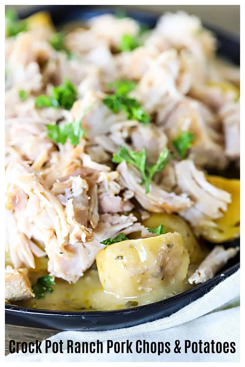 These Creamy Ranch Crock Pot Pork Chops and Potatoes are fork-tender and melt in your mouth! The sauce has the perfect seasonings that pairs so well with the pork and potatoes. A must make slow cooker dish! via @jennikolaus