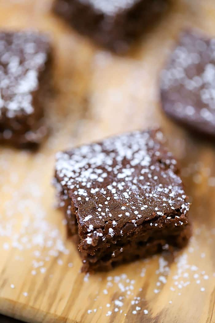 Close up shot of these delicious Brownie Bites topped with powdered sugar!