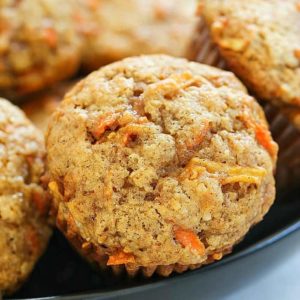 Apple Carrot Muffins (also known as Sunshine Muffins) are soft muffins filled with carrots, apples, coconut, cinnamon & nutmeg. They bake up in no time and will be a crowd pleaser!