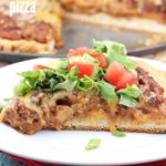 Easy Tostada Pizza is a fun cross between a taco, pizza and a tostada! Yummy, quick & easy dinner for any night of the week!