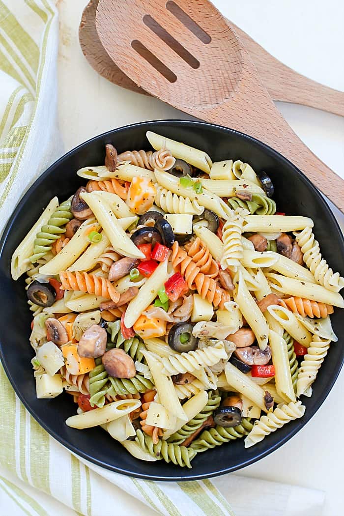 This unbelievable Best Ever Pasta Salad will be the hit of the picnic! Full of pasta, cheese cubes, pepperoni, olives and veggies and topped with a homemade dressing - this will be an instant favorite!