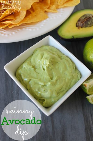 Square bowl filled with Skinny Avocado Dip with a side of tortilla chips - 43 Healthy Snack Ideas
