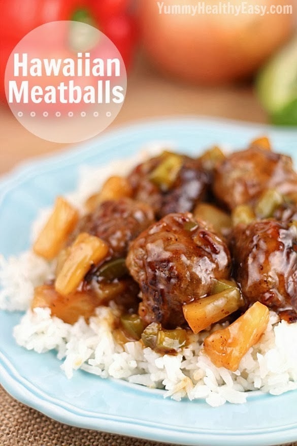 These Hawaiian Meatballs are made with a ground beef mixture that includes graham cracker crumbs, then cooked with an easy tangy sweet and sour sauce, pineapple tidbits and green peppers. 30 minute or less meal!