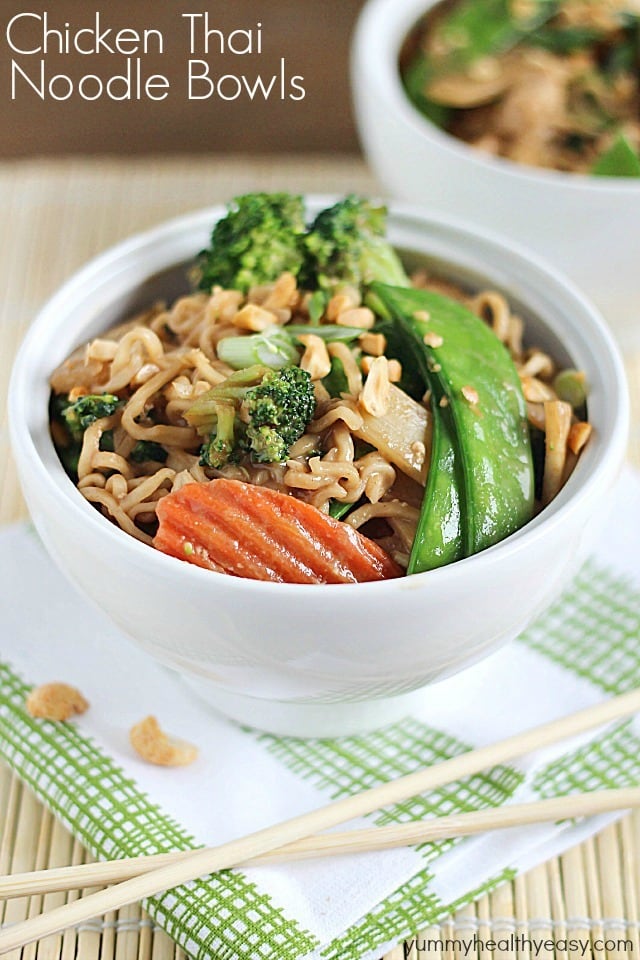 A new spin on ramen noodles - Chicken Thai Noodle Bowls! Ramen noodles and stir-fry veggies tossed in a quick & easy peanut sauce and topped with chopped peanuts and green onions. Bye bye boring ramen!