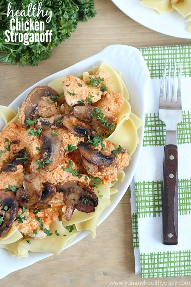 Healthy and creamy chicken stroganoff (made using yogurt, surprise!) and served over egg noodles. 