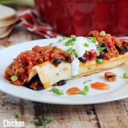 Healthy and delicious enchiladas with chicken, black beans and quinoa rolled inside flour tortillas. Guiltless and easy dinner!