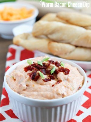 Delicious and super EASY breadsticks (made with Pillsbury Grands! Biscuits) and a warm bacon cheese dip to dunk them in!!