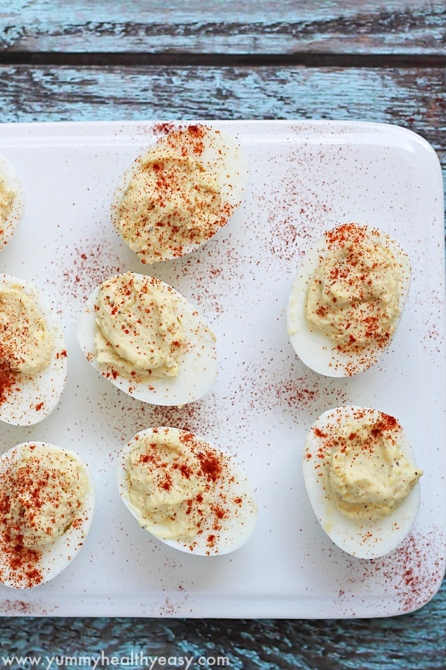 Easy Deviled Eggs - creamy, simple, delicious recipe. Perfect to bring to a party, everyone loves these!