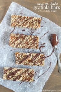 Top view of Easy No-Bake Granola Bars with oats, almonds and coconut with a delicious chocolate & Nutella drizzle on top + 43 Healthy Snack Ideas