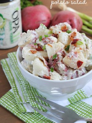 Super easy potato salad recipe using only FOUR simple ingredients! Perfect to serve with your next BBQ. Plus it's gluten-free!