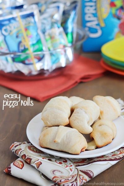 Simple & delicious Pizza Rolls made from ready-made pizza dough, mozzarella sticks, pizza sauce and pepperoni all rolled together in a fun little bite and served with a refreshing Capri Sun! #ad