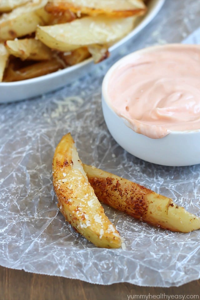 Potato wedges that are baked, sprinkled with parmesan, and then served with fry sauce. Can't wait to try these!