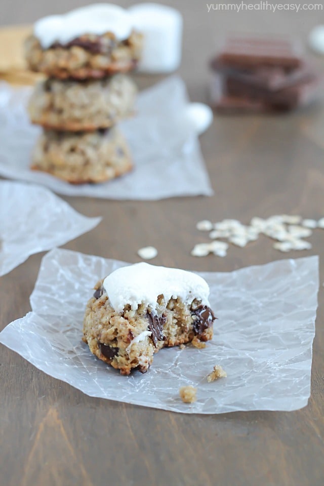 Moist and chewy oatmeal cookies with graham crackers and chocolate pieces inside and an ooey gooey marshmallow cooked on the top!