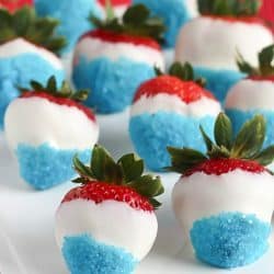 Fun & easy patriotic white chocolate strawberries using white chocolate and blue sprinkles. #4thofjuly