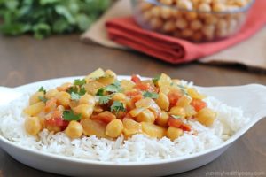 Coconut Chickpea Curry - chickpeas in a creamy curry sauce and served over rice. Quick, easy and absolutely delicious!