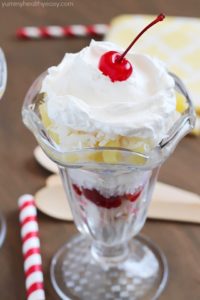 Tropical Trifle - layers of angel food cake, strawberries, pineapple, coconut, cream of coconut & topped with whipped cream! So tasty!