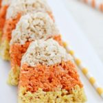 The cutest little Candy Corn Rice Krispie Treats make a fun Halloween snack and/or treat!