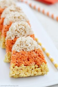 The cutest little Candy Corn Rice Krispie Treats make a fun Halloween snack and/or treat!