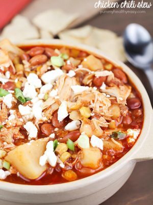 Yummy crock pot chicken chili stew with pinto beans, potatoes, corn, spices and topped with feta cheese. Easy prep and so delicious!