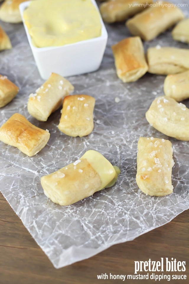 Pretzel Bites dunked in an EASY honey mustard dipping sauce...perfect for noshing after school or while watching a football game!