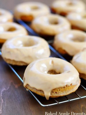 These Baked Apple Donuts with Maple Glaze are seriously the best baked donuts ever! Moist, apple-spiced flavor dipped in the tastiest maple glaze known to man. And only 196 calories per donut!