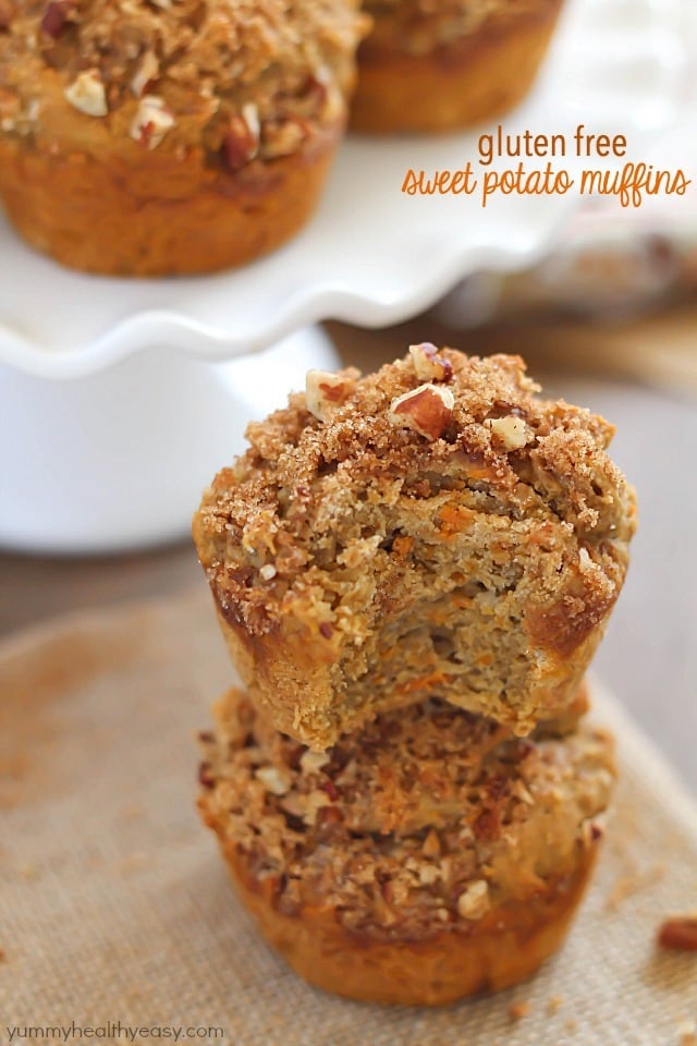 Gluten Free Sweet Potato Muffins (with cranberry sauce inside, too- perfect fall breakfast!) topped with a brown sugar-nut topping. So moist & delicious!