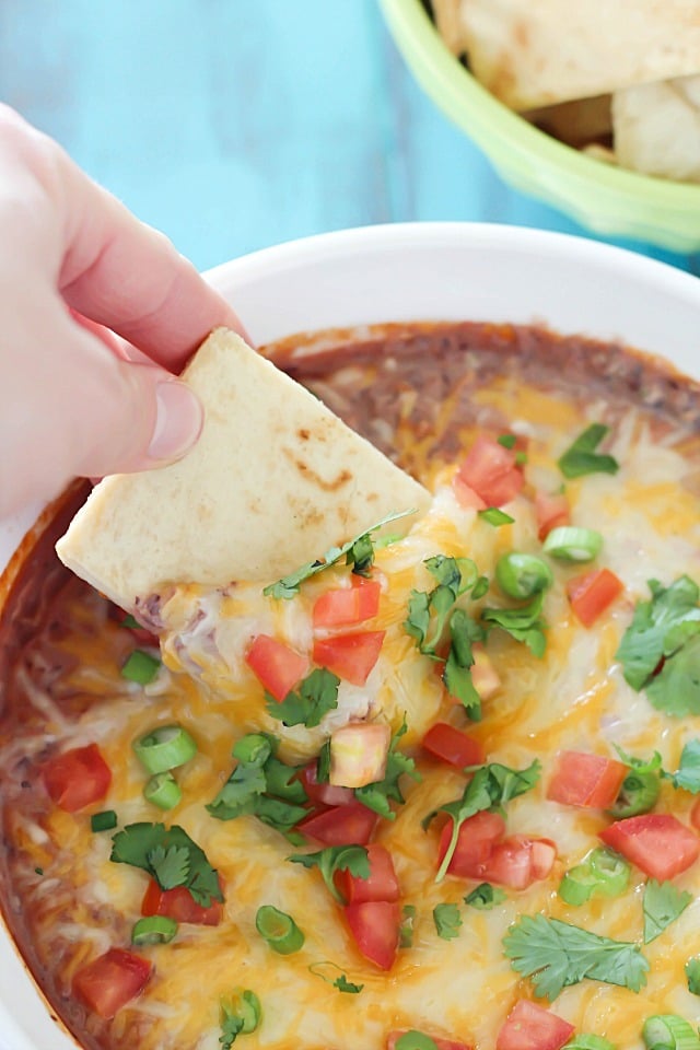 Healthy and addicting black bean dip - the perfect snack full of protein to keep you satisfied! Best served with pita chips, tortilla chips or veggies.