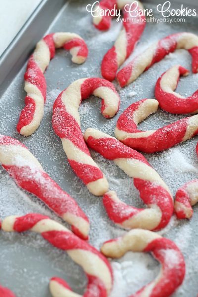 Get the whole family in the kitchen and make these adorable Candy Cane Cookies this holiday season! They're fun to make, super cute and totally delicious!