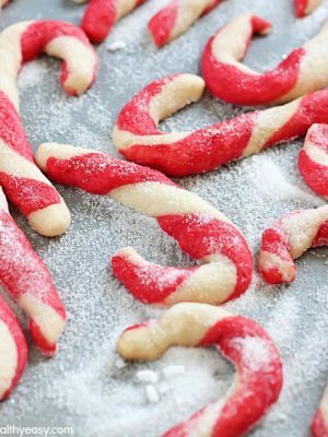 Get the whole family in the kitchen and make these adorable Candy Cane Cookies this holiday season! They're fun to make, super cute and totally delicious!