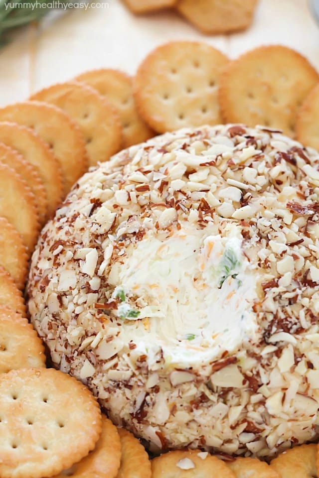 A super easy cheese ball that's sure to impress any guests! It's creamy, tangy, irresistible and won't take more than a few minutes to whip up.