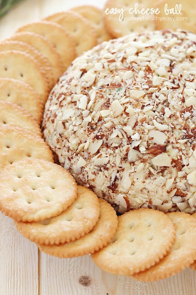 This super easy cheese ball is sure to impress any guests! It's creamy, tangy, irresistible and won't take more than a few minutes to whip up.