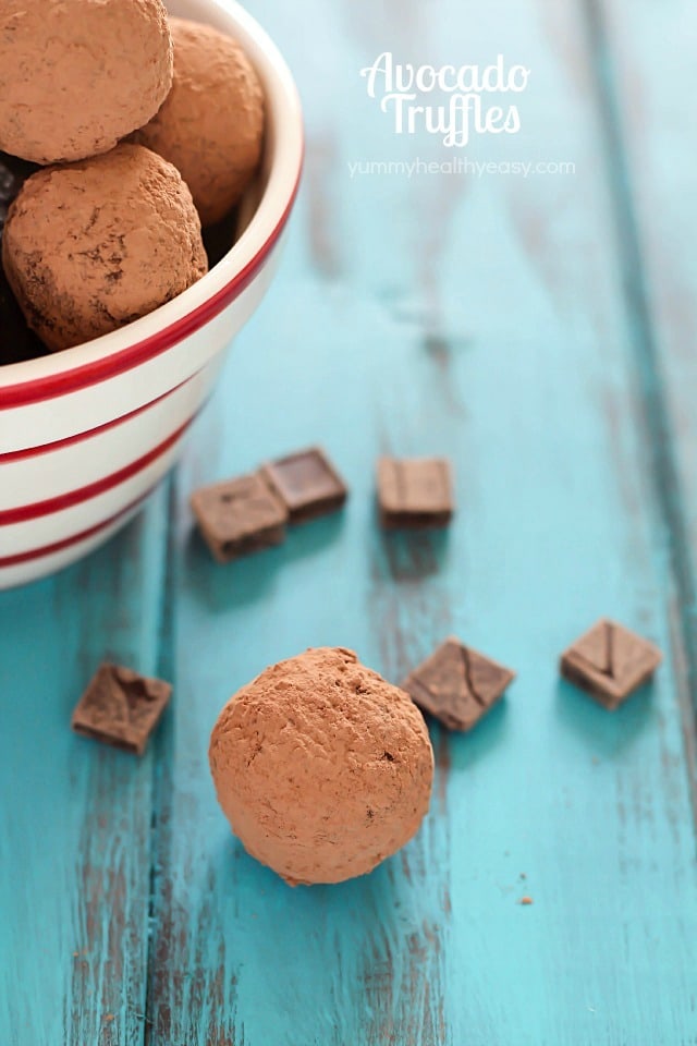 An unbelievably smooth, creamy and decadent truffle chocolates recipe made with...wait for it... AVOCADO! Only 94 calories per truffle! These are so ridiculously good and a must-make healthy treat for Valentine's Day!