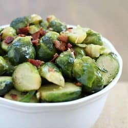 Need an easy side dish? This bacon brussels sprouts recipe is the way to go! They're fancy enough to serve as a side dish at a party but quick & easy enough to be added in with a weeknight meal.