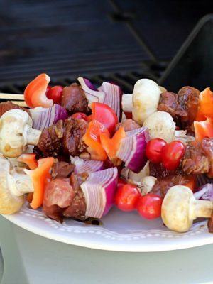 Delicious grilled shish kabobs with tender pork, mushrooms, red peppers, tomatoes and onions. The perfect game day or ANY day meal! #evergriller #ad