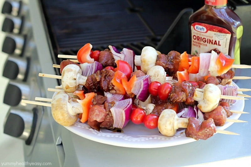 Delicious grilled shish kabobs with tender pork, mushrooms, red peppers, tomatoes and onions. The perfect game day or ANY day meal! #evergriller #ad