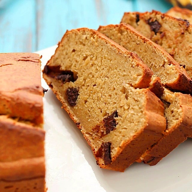 Healthy Banana Bread recipe made with a secret ingredient ;) and all in the food processor! It's moist, decadent and perfect for using up those ripe bananas laying on your counter.