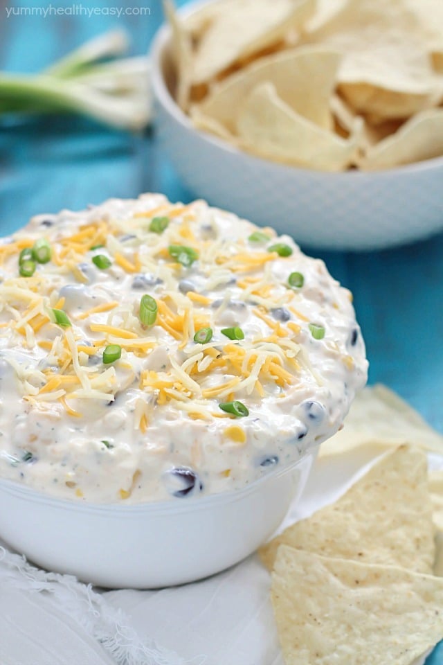 Quick Southwest Dip that's perfect for whipping up when entertaining guests or to devour when watching your favorite TV show. Creamy ranch & southwestern flavors, corn, black beans and cheese - so delicious! #cadairy