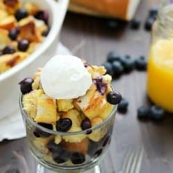 What's better than french toast? Blueberry French Toast Casserole! Delicious casserole with cubes of bread and blueberries baked in an egg and orange juice mixture. Perfect for Easter breakfast... or breakfast any day!
