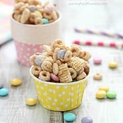 Super delicious and easy Bunny Bait aka Easter Snack Mix. Made with cereal, pretzels, peanuts, pastel M&M candies and white chocolate - perfect for Easter!