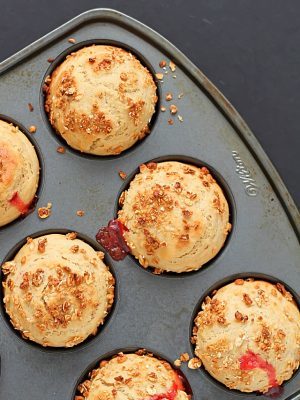 Simply delicious Strawberry Jam (filled) Breakfast Muffins. Make extras and freeze, then heat in the microwave for a few seconds for a quick breakfast!