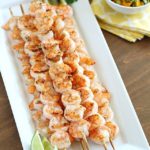 Healthy Grilled Shrimp Skewers with Mango Salsa - an easy and flavorful main dish that's the perfect summertime meal!