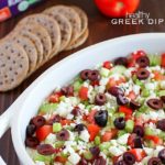 Deliciously healthy greek dip, made with a protein-rich cottage cheese base (with ranch seasonings!) then topped with cucumbers, green onions, tomatoes, kalamata olives, and feta cheese. Healthy and full of flavor! #breton #ad