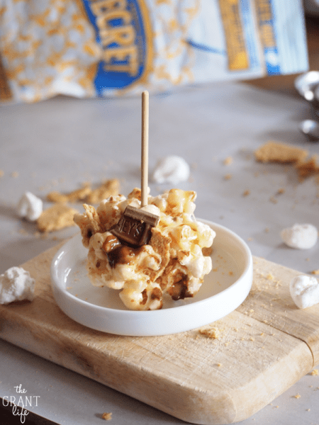 S'mores Popcorn Balls by TheGrantLife.com - These popcorn balls are easy to make and perfect for an indoor s'mores treat!