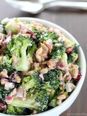 Need an easy side dish? Make this Creamy Broccoli Salad! It's full of fresh broccoli, red onion, dried cranberries, sunflower seeds and bacon mixed in a creamy, delicious dressing. Always a hit!