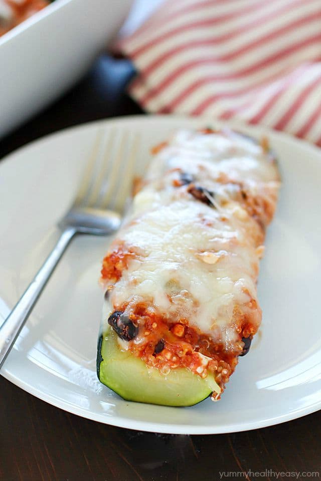 Healthy Black Bean & Quinoa Stuffed Zucchini - a hearty and easy meatless side dish or dinner that's gluten-free and clean-eating. So delicious, you won't even think it's healthy!