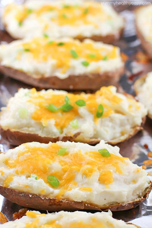 Craving a twice baked potato but don't want all the calories? Make some Healthy Twice Baked Potatoes! With few ingredients and double the flavor, you will LOVE these!