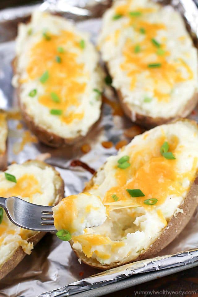 Craving a twice baked potato but don't want all the calories? Make some Healthy Twice Baked Potatoes! With few ingredients and double the flavor, you will LOVE these!