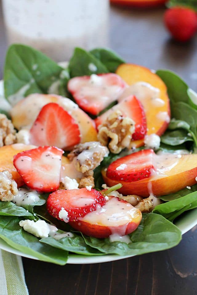 Spinach Salad with strawberries, peaches, candied walnuts, goat cheese and a crazy good (and crazy easy) homemade poppyseed dressing! PLUS a Blendtec Giveaway!